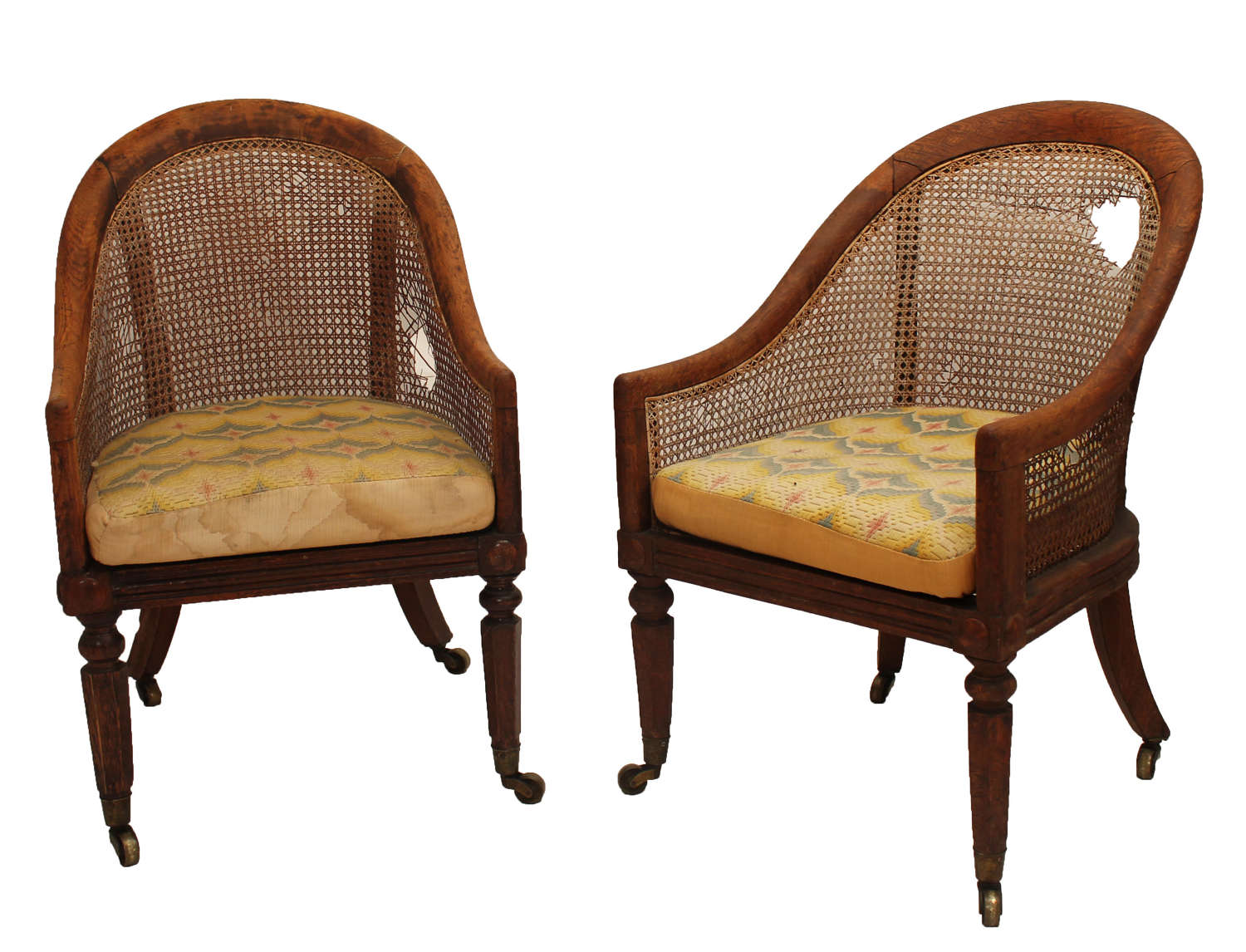 Pair of Gillow Library Bergere chairs